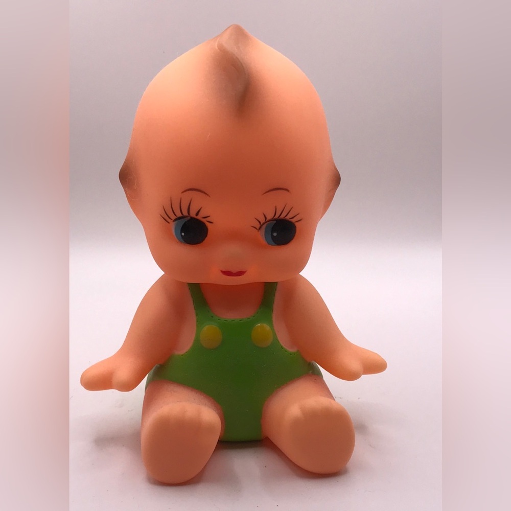 Rubber kewpie made to mimic the vintage